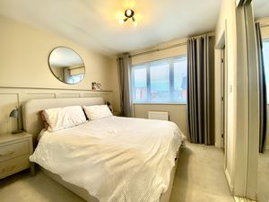 Bedroom One- click for photo gallery